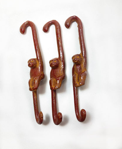 Hanging ikebana vase - monkey reaching for a moon (pine branches/ brown)