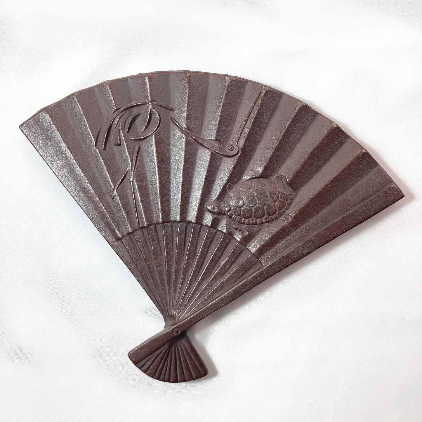 Japanese cast iron coaster / teapot holder / nabeoki - hand fan