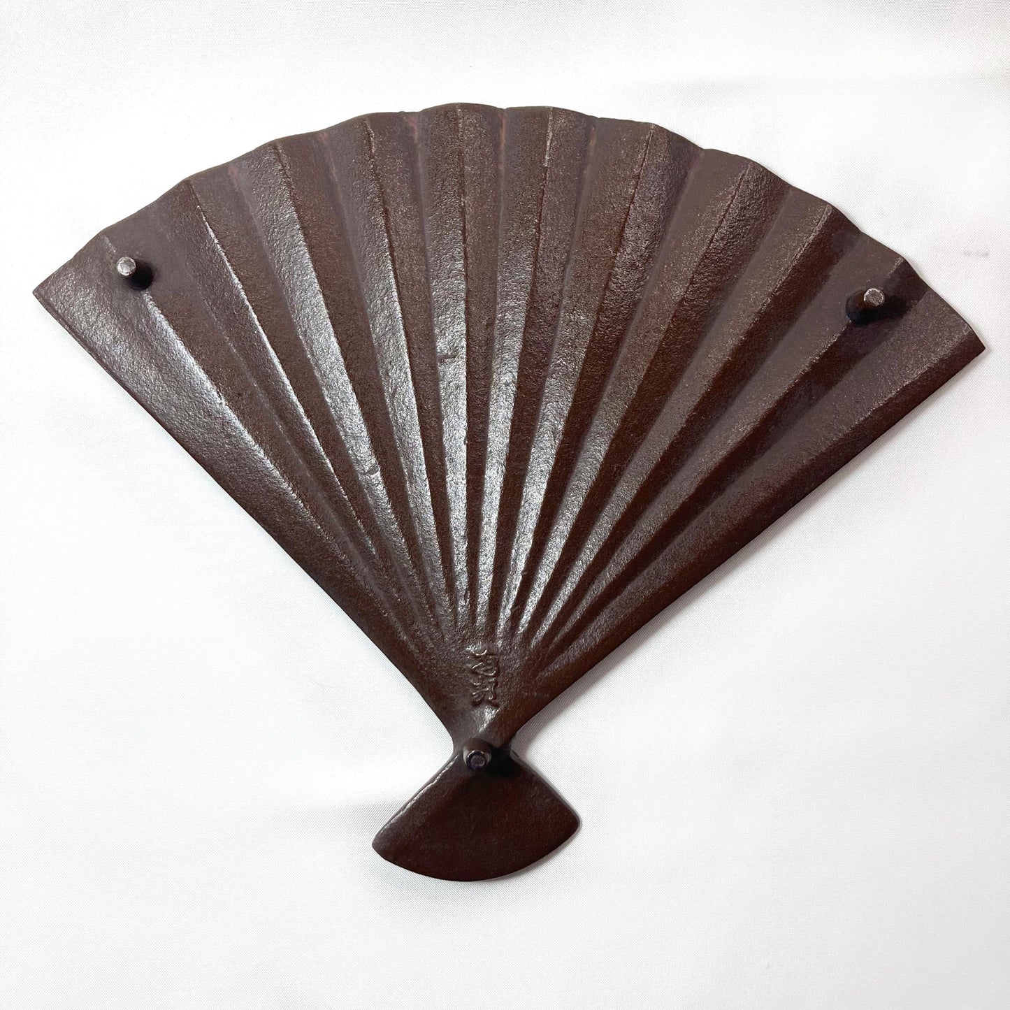 Japanese cast iron coaster / teapot holder / nabeoki - hand fan