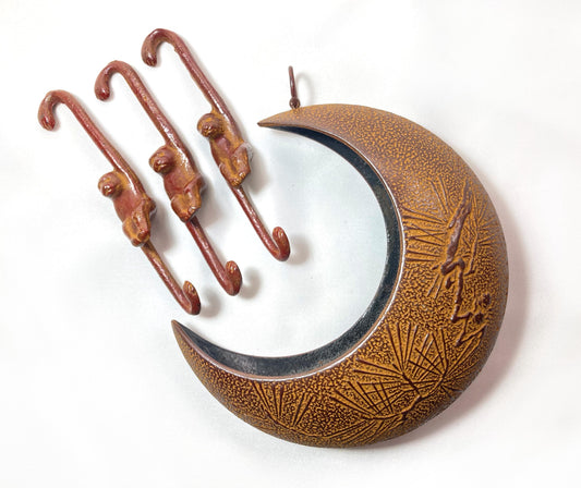 Hanging ikebana vase - monkey reaching for a moon (pine branches/ brown)