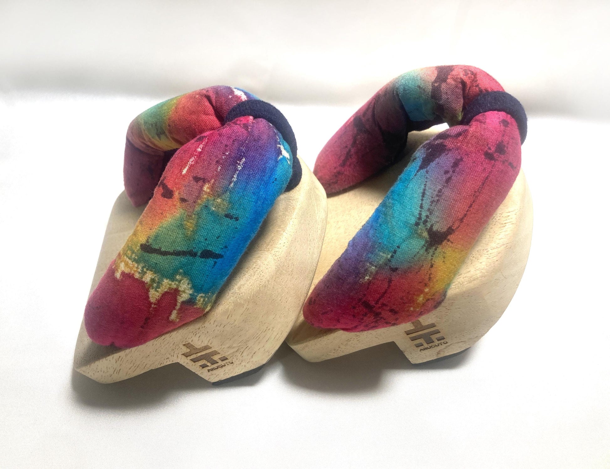 Curious Japanese wooden geta - "one tooth" balancing shoes with rainbow straps