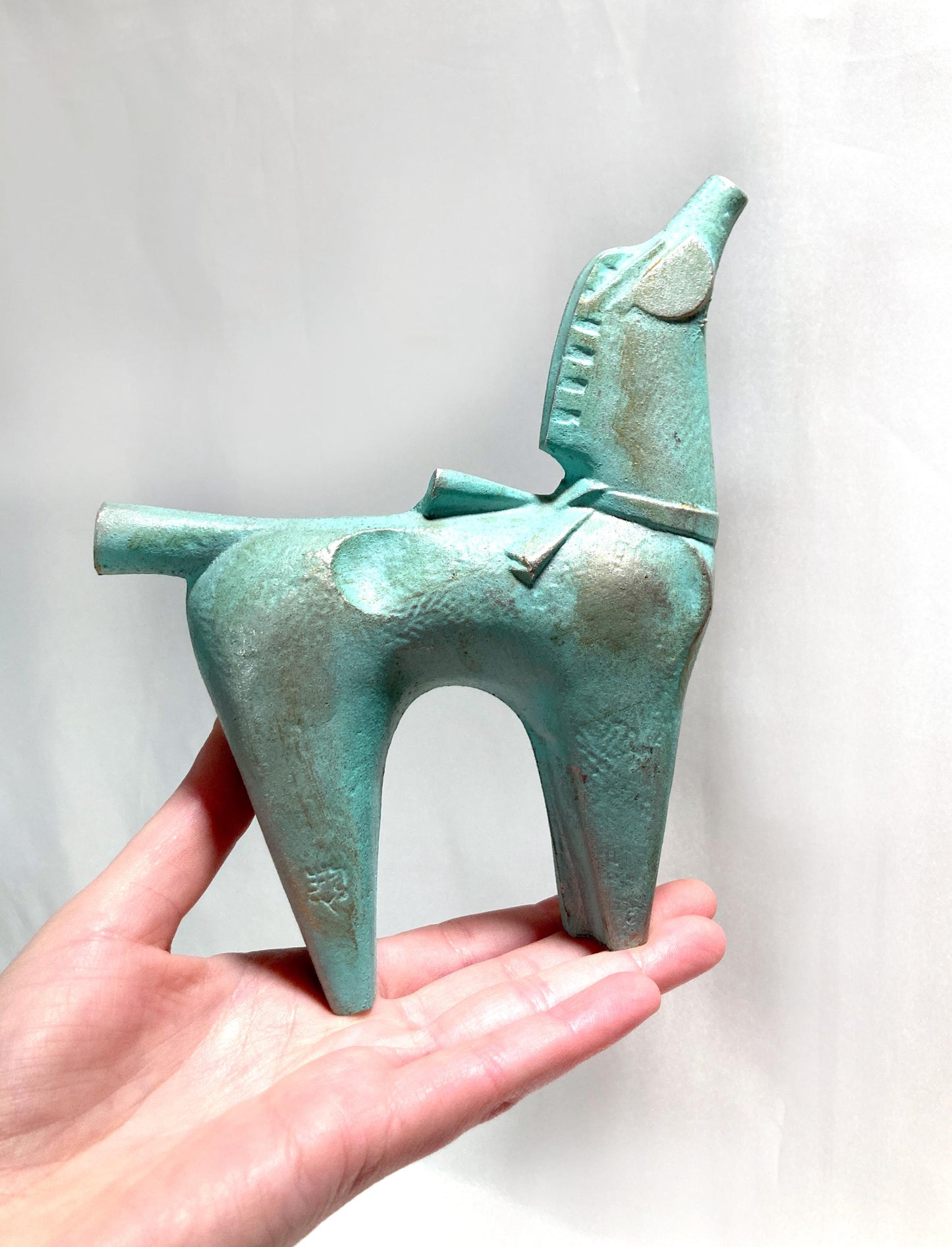 Vintage zodiac sign iron cast statuette - horse with a ribbon