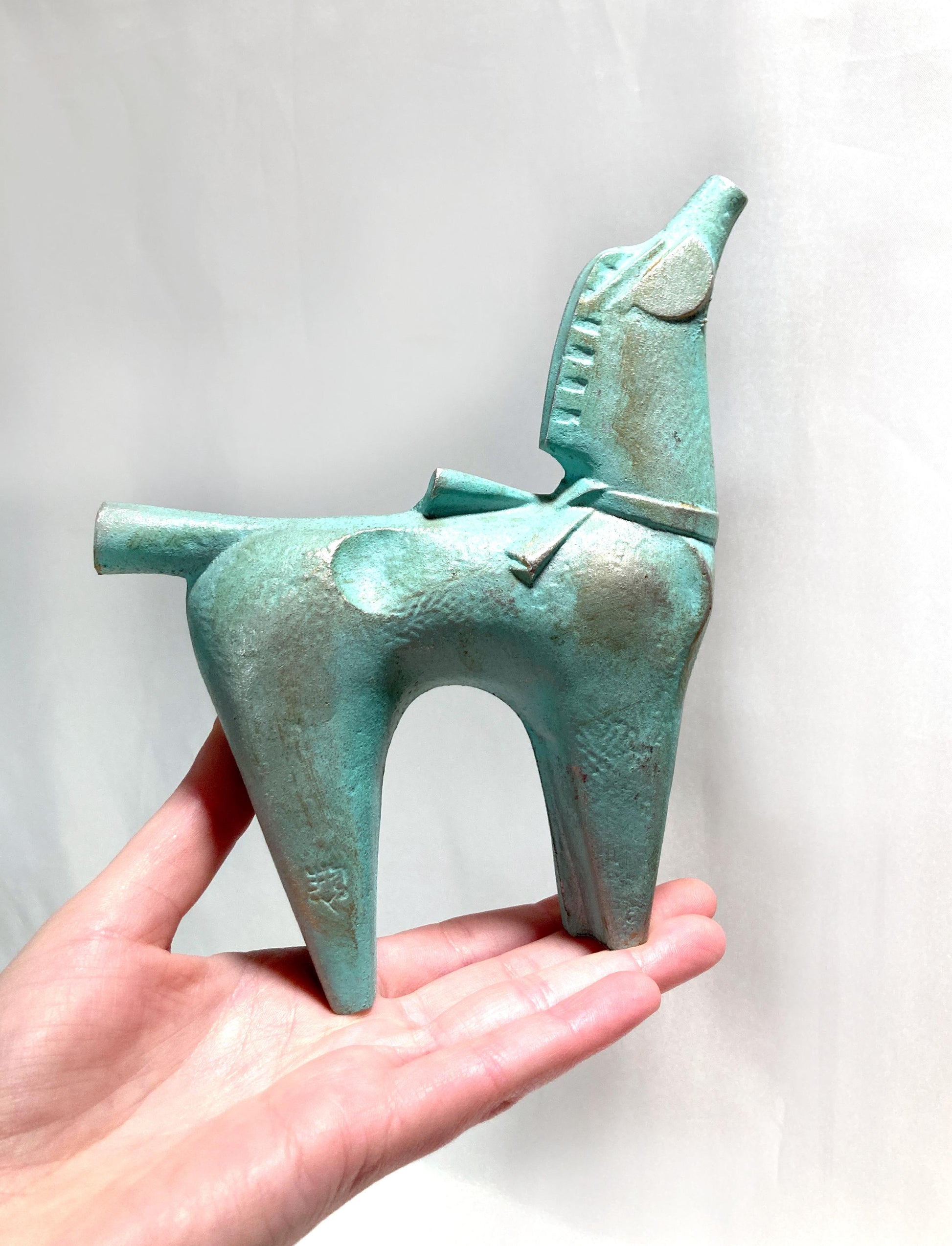 Vintage zodiac sign iron cast statuette - horse with a ribbon