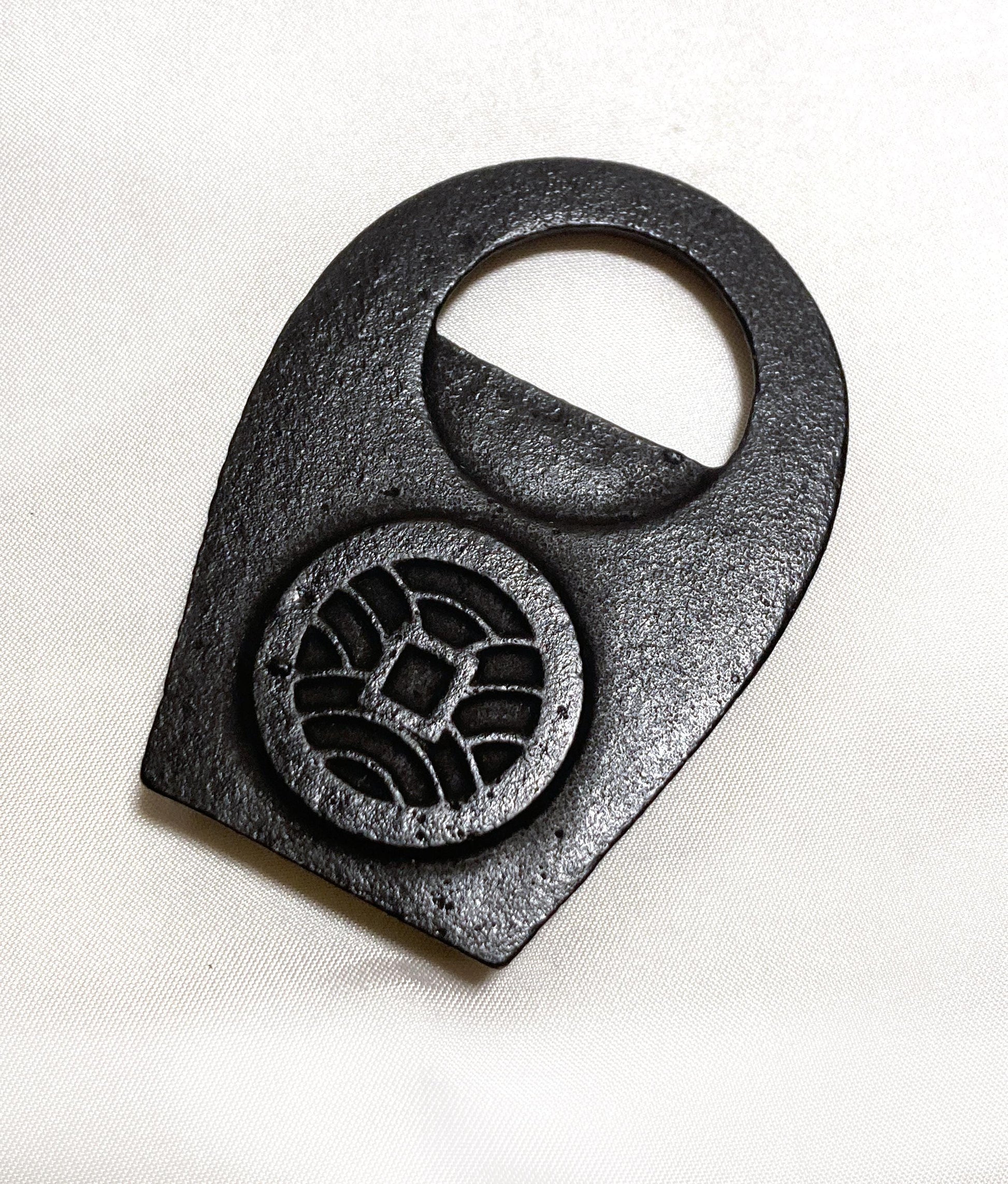 Japanese cast iron bottle opener - lucky coin