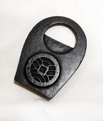 Japanese cast iron bottle opener - lucky coin