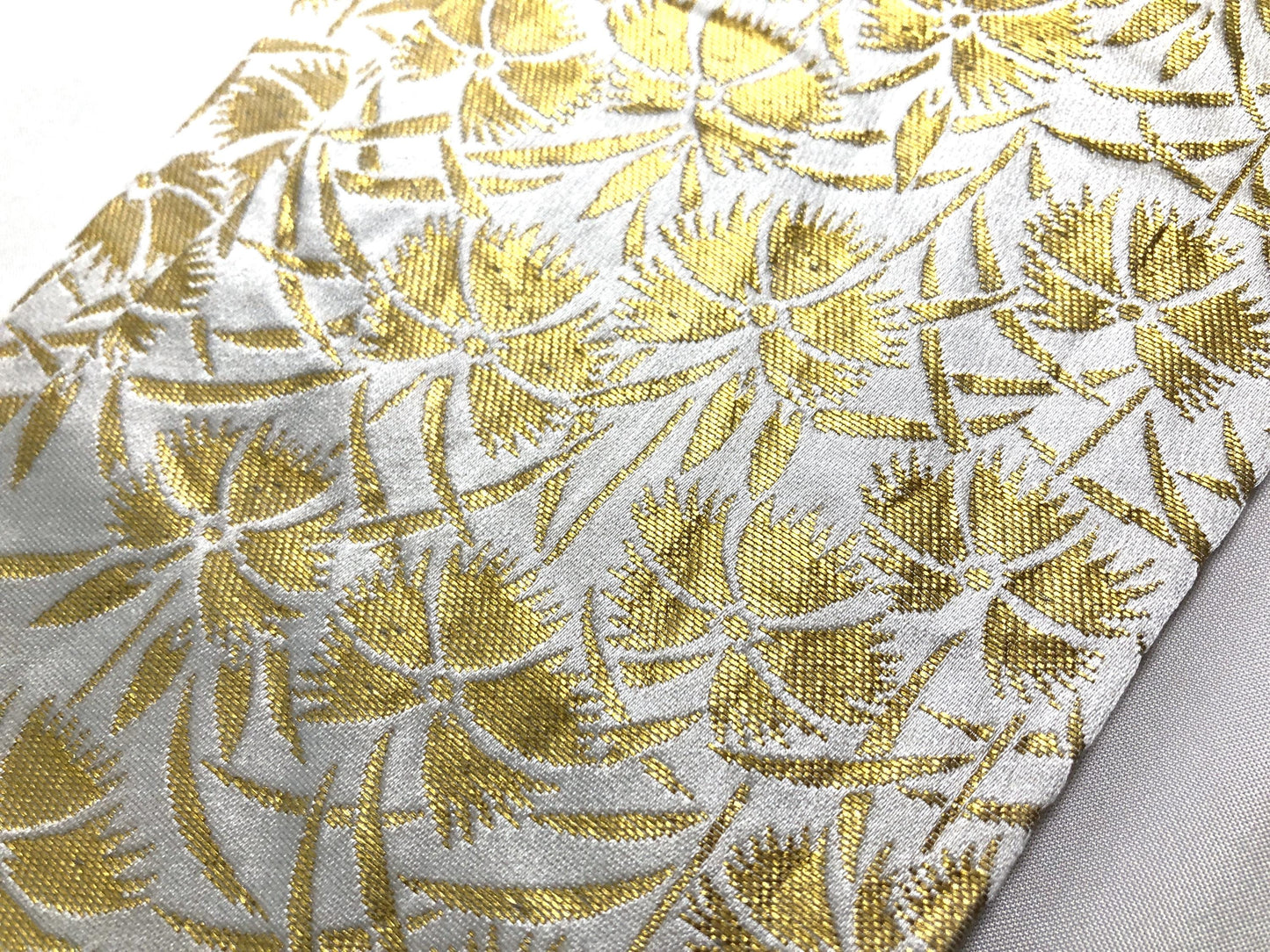 Festive narrow obi - golden and white floral pattern