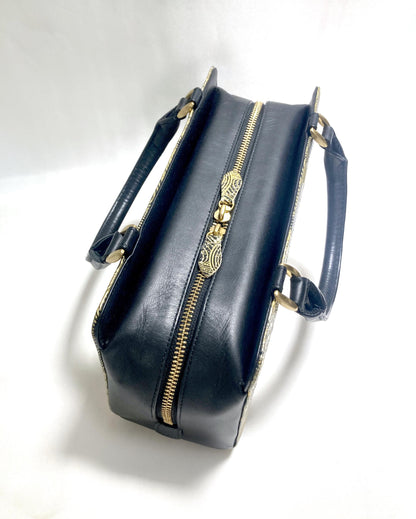 Vintage kimono handbag - synthetic black leather with textured golden cranes pattern