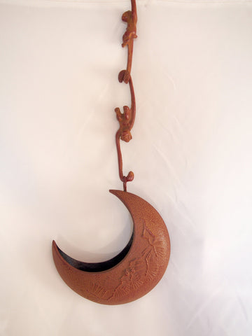 Hanging ikebana vase- monkey reaching for a moon