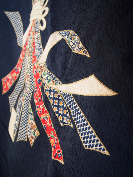 Navy blue noren with ribbon motif