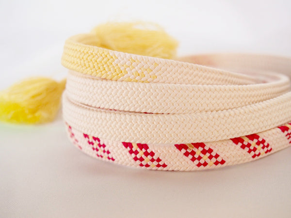 Pastel silk obijime - cream yellow with magenta accents