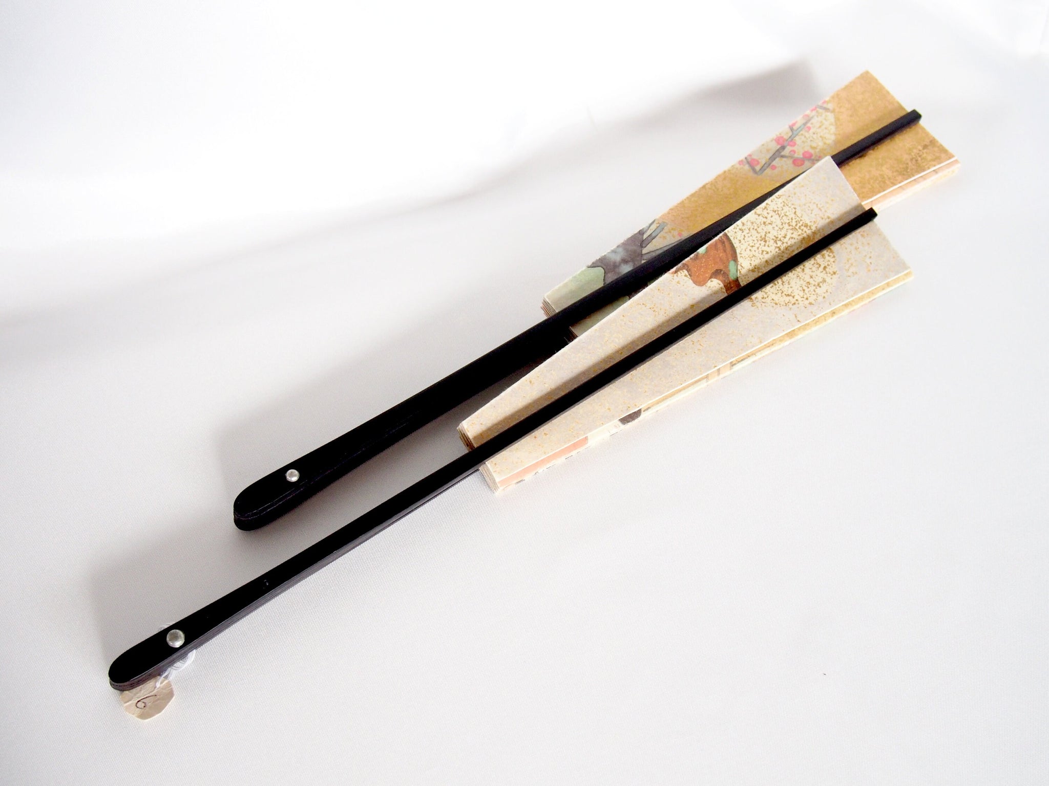 Foldable paper handfans with scenes of Heian court - set of two