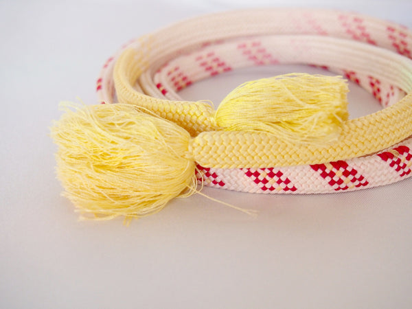 Pastel silk obijime - cream yellow with magenta accents
