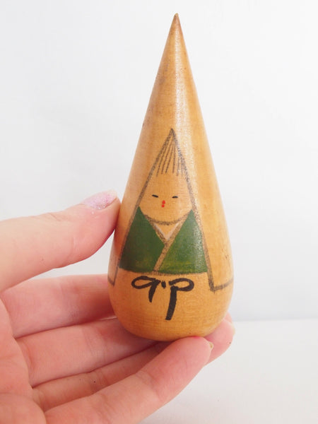 Miniature wooden kokeshi doll- girl in a winter coat