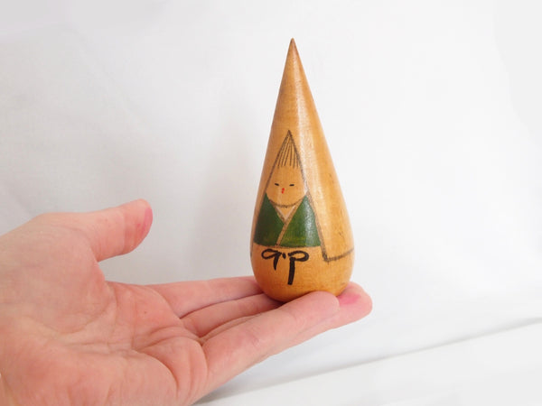 Miniature wooden kokeshi doll- girl in a winter coat