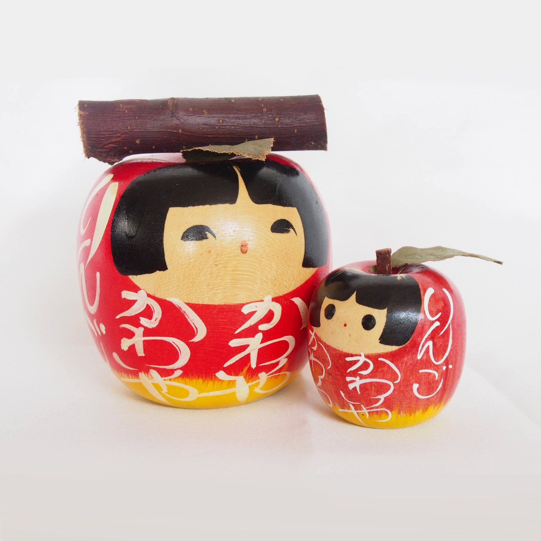 Adorable apple kokeshi- mother and daughter pair