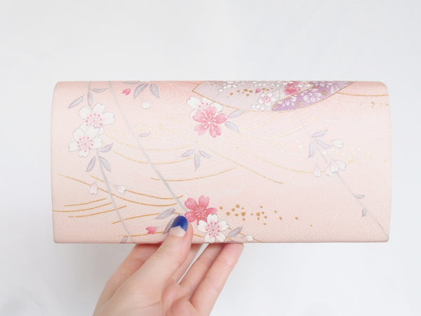 Pastel pink Japanese clutch bag with peony and sakura pattern