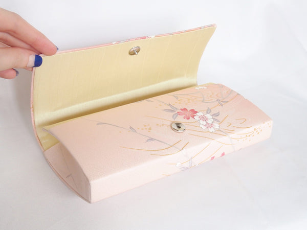 Pastel pink Japanese clutch bag with peony and sakura pattern