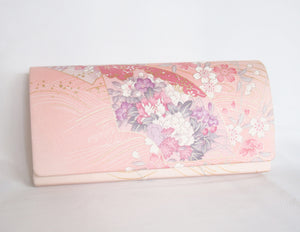 Pastel pink Japanese clutch bag with peony and sakura pattern