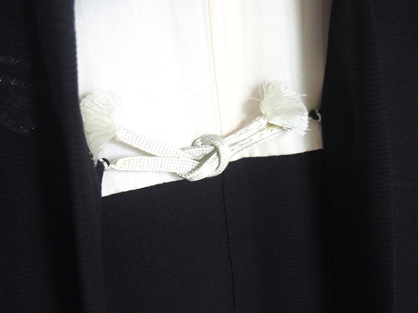 Elegant Japanese kimono coat - haori - black with golden waves pattern and family crest