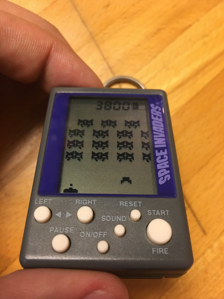 Space Invaders mini pocketable electronic game